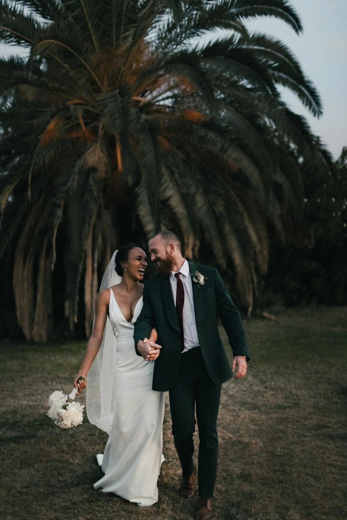 Wedding videography team filming ceremony at Spanish coastal venue