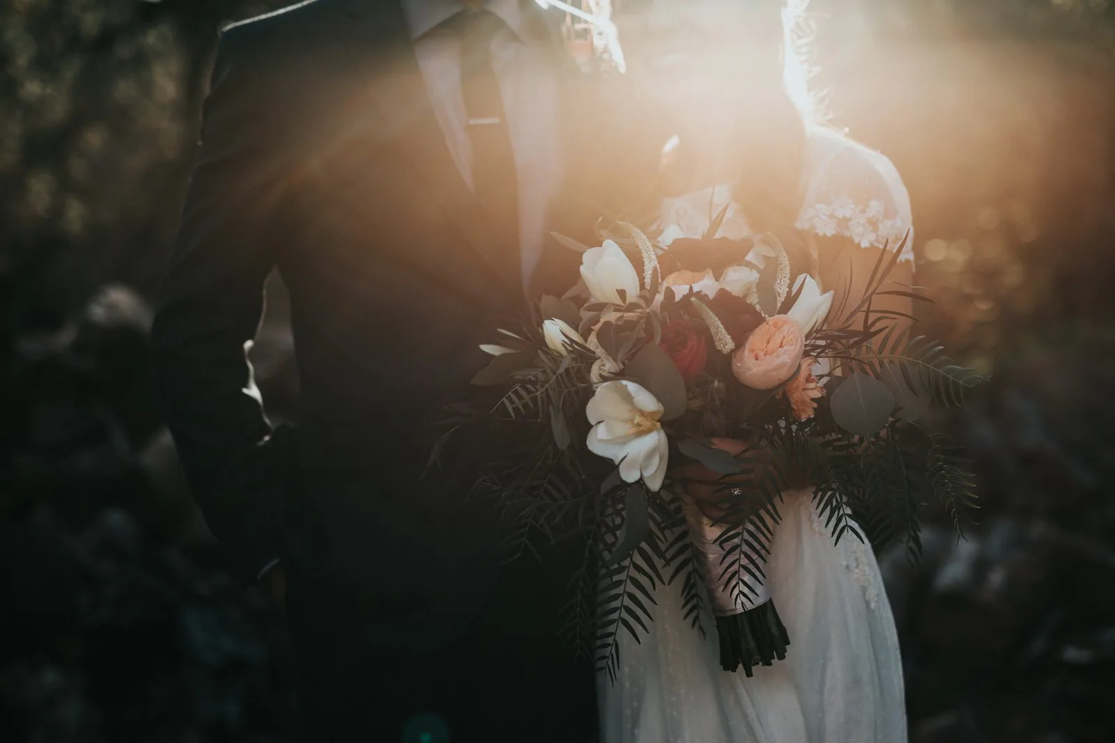 Wedding day coordination in action with planner managing vendors at Spanish venue