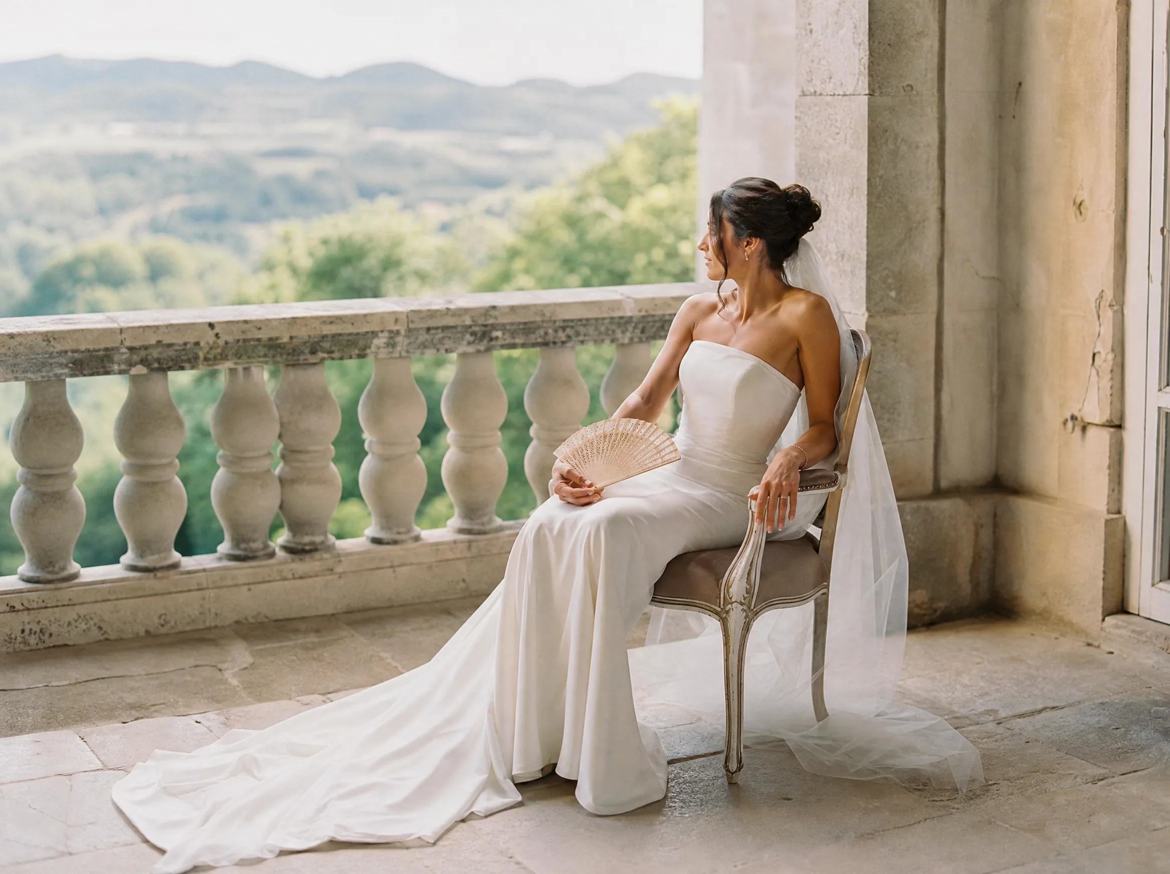 Luxury wedding detail: Choose fan styles that photograph cleanly and pack easily