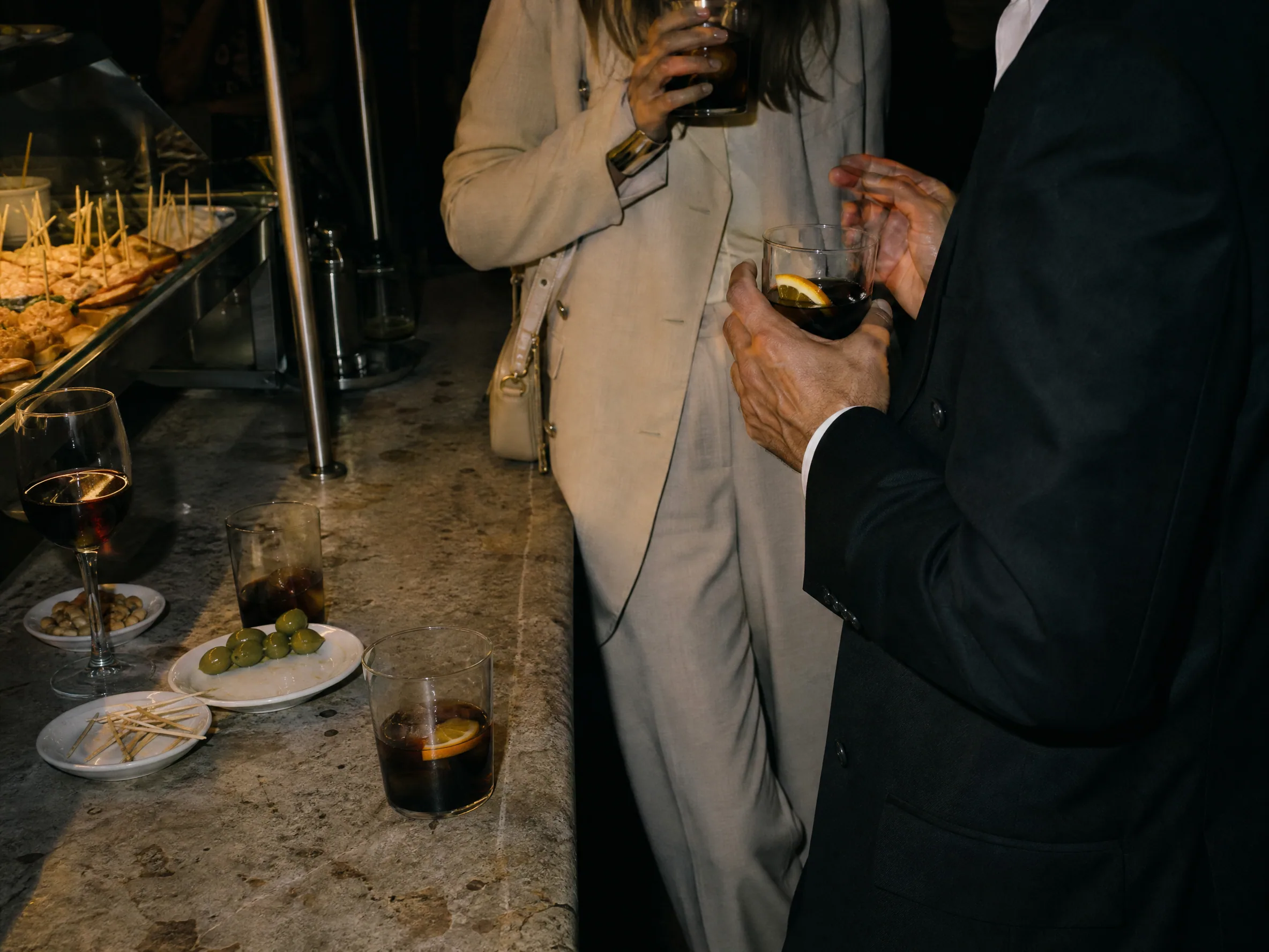 Wedding reception detail: Bars, tapas counters, café, and vermouth hour