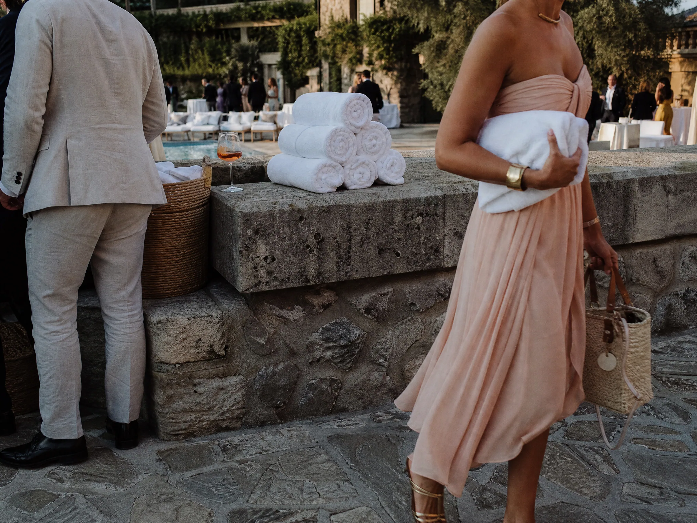 Wedding reception detail: Towel Deposits, Wristbands, and the Hotel Toalla Desk
