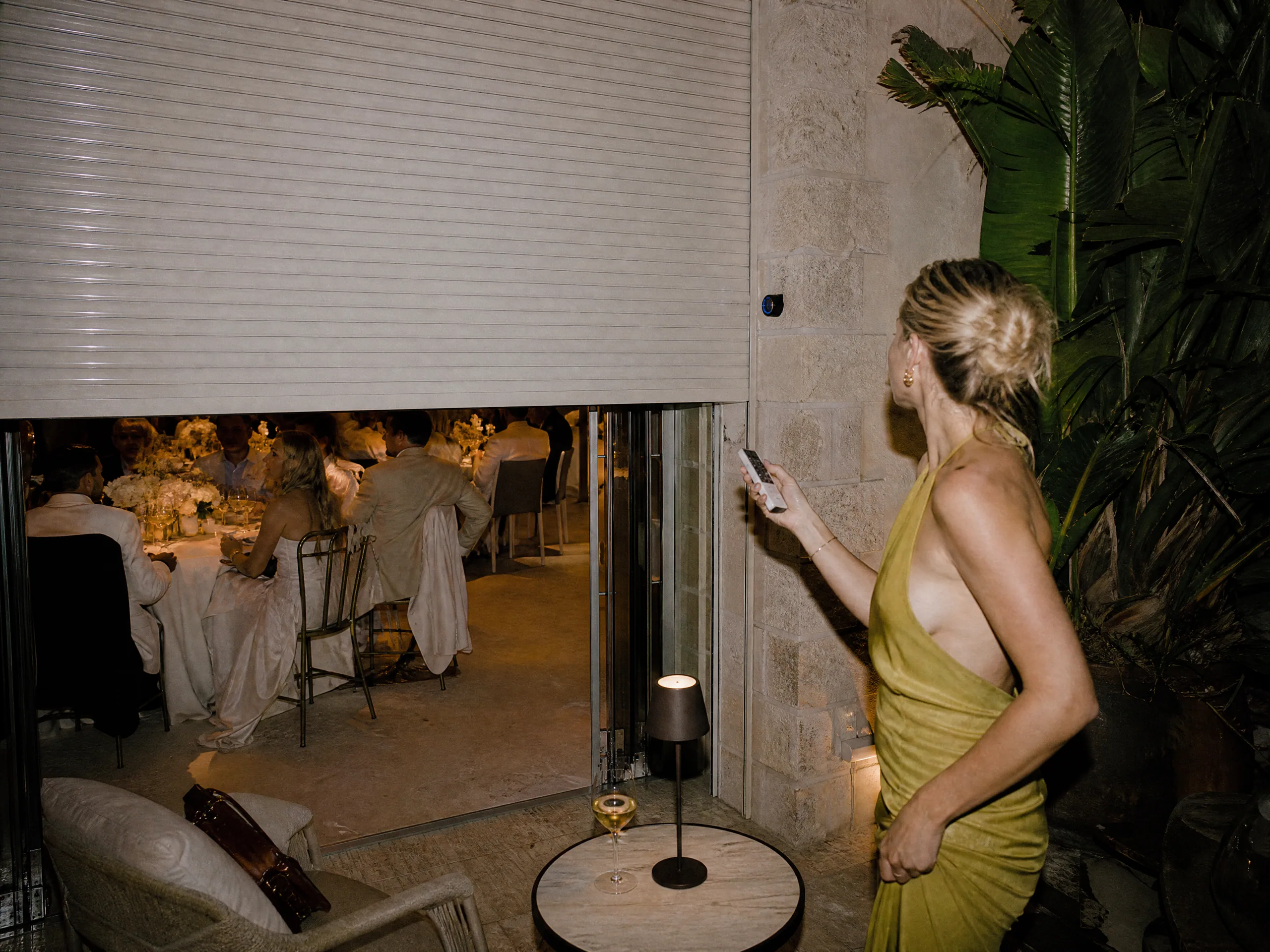 Wedding reception detail: Manual Straps, Cintas, and Motorized Remotes